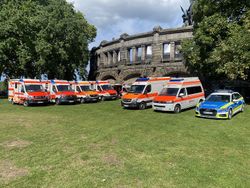 Rettungsfahrzeuge des Malteser Hilfsdienstes am Deutschen Eck in Koblenz