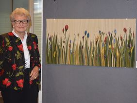 1. Platz, Woll-Webarbeit „Wildblumen“ von Rosemarie Wichmann (Foto: Malteser / Beimforde) 