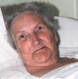 Joan in a care centre bed; newsletter no. 36, 2017