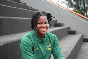 Mary Zulu lächelt im grünen Trikot der Springbok Women