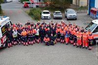 Die Teilnehmenden der Großübung versammelt auf einem Gruppenbild 