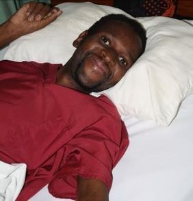 Sicelo smiling in the hospice