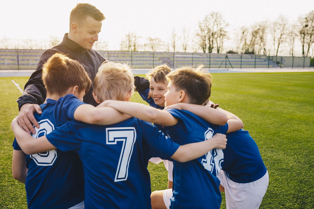 Fußballteam und Trainer 