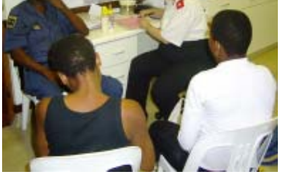 People seated together at the Children’s Home.