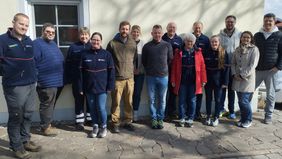 Gruppenfoto: Teilnehmende und Ausbildungsteam des internen Resilienztrainings