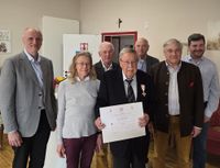 Gruppenfoto der Malteser mit dem ausgezeichneten Mediziner 