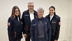 Gruppenfoto von drei Frauen und einem Mann in Malteser Dienstbekleidung.