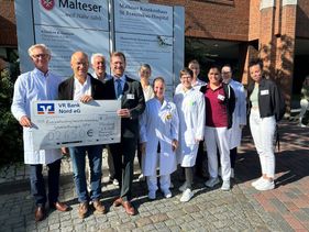 Scheckübergabe KI-Konturierung Strahlentherapie