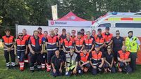 Gruppenfoto eines Teils des Teams (mehr als 20 Personen mit Einsatzleiter Kevin Braun)
