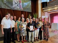Gruppenfoto der Ortsleitung, der Ehrengäste und der geehrten Malteser-Mitglieder