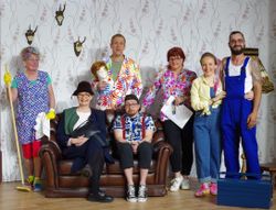 Die Gruppe Schauspieler in einem Gruppenfoto