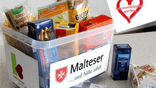 Kunststoffkiste mit Lebensmitteln gefüllt