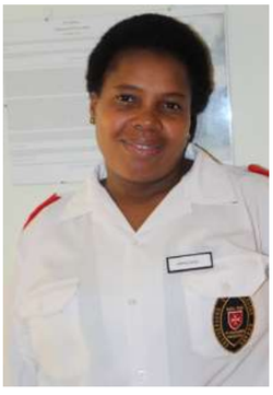 Zinhle Zulu wearing a white care uniform.