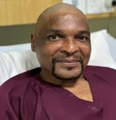 Falakhe sitting in the hospice