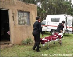 Hospice team carries a patient on a stretcher to the ambulance; newsletter no. 35, 2016